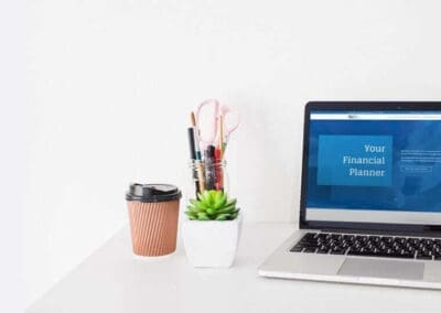 Your Financial planner website design on Laptop in modern office