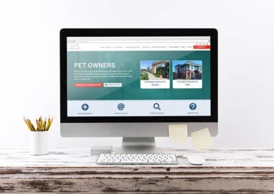 Vet Specialists Ireland website Computer Mockup Wooden Desklage banner by DesignBurst for web