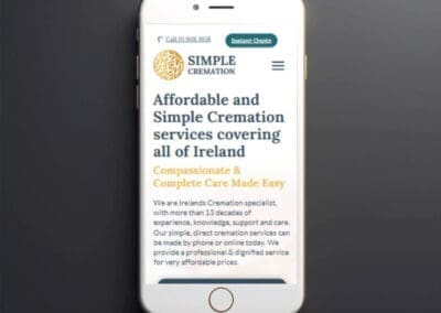 Black smartphone on dark background mockup to showcasing Simple Cremation Website